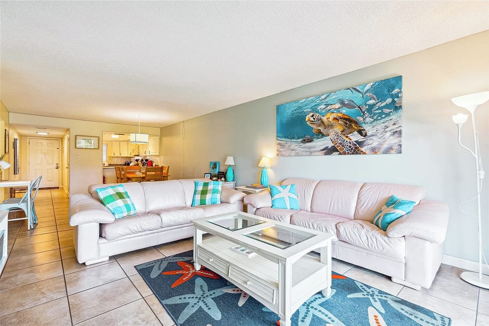 Cozy coastal living room with soft colors and beach-inspired decor