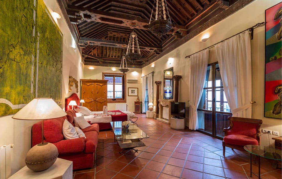 Suite, Balcony | Down comforters, minibar, in-room safe, individually decorated