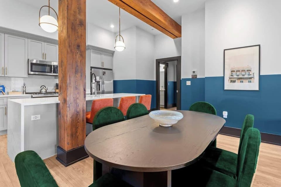Enjoy meals together at your in-suite dining table with seating for your group. Whether it’s takeout, delivery, or a home-cooked meal, this cozy dining area makes every stay at 888 Baronne feel like home in New Orleans.