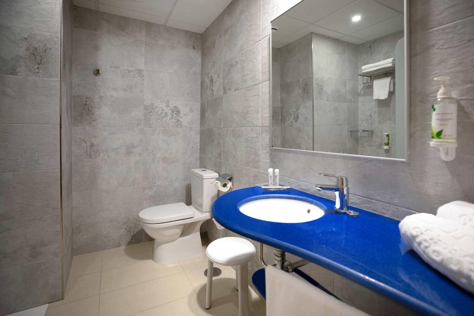 Double Room, Terrace (2 Adults + 1 Child) | Bathroom | Shower, hair dryer, towels