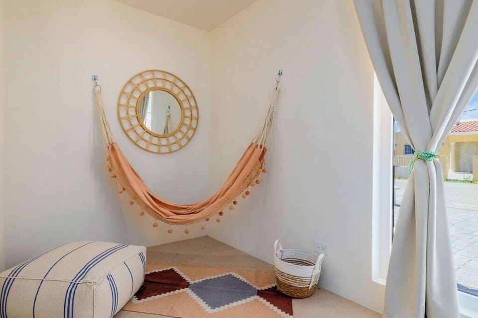Bedroom 4
Relaxation awaits in our cozy bedroom, featuring a charming hammock. Drift into serenity and sway gently as you escape into a world of tranquility.