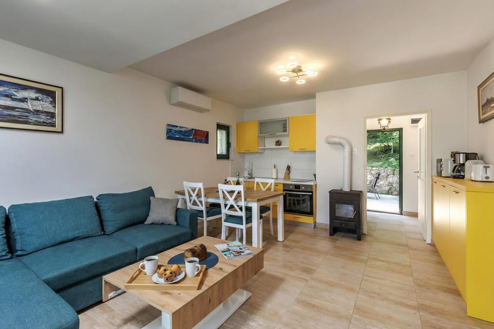 Family House, 2 Bedrooms, Microwave, Mountainside (Beachside House Lara) | Living area | Flat-screen TV