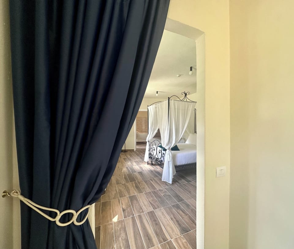Suite, River View | In-room safe, desk, laptop workspace, blackout drapes