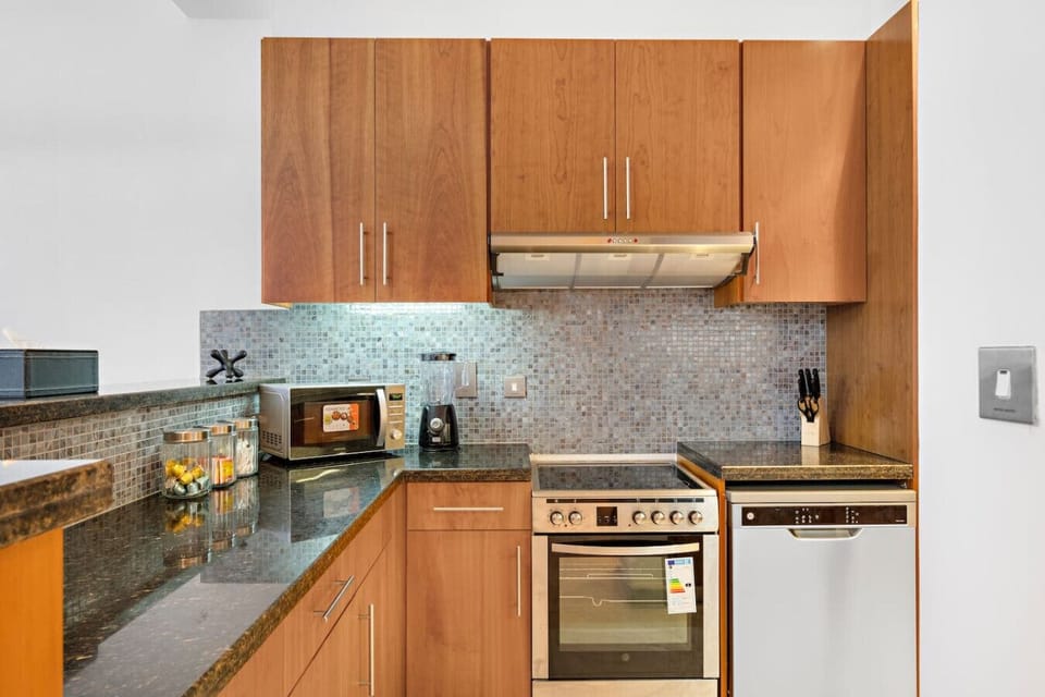 Kitchen: Modern appliances and stylish décor invite culinary adventures in Dubai!
