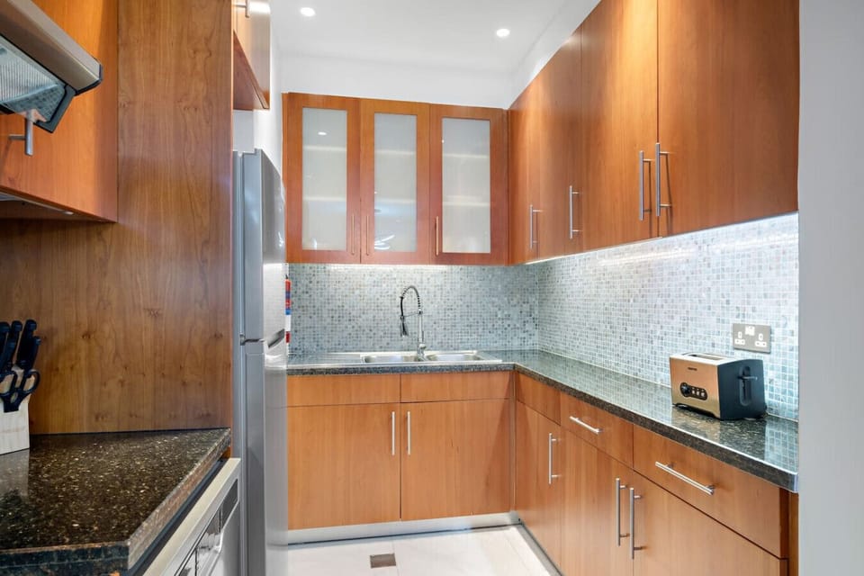 Gourmet Kitchen: Whip up culinary delights in a sleek, modern space with stylish finishes!