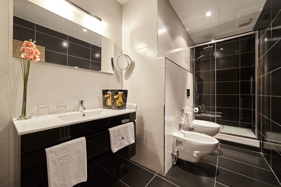 Eco-friendly toiletries, hair dryer, bidet, towels