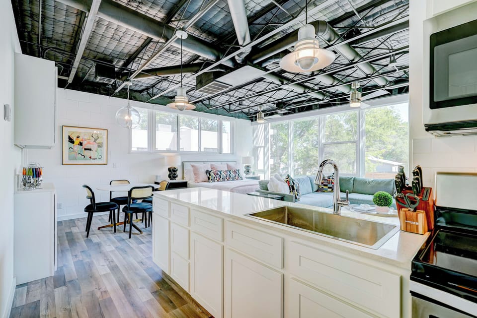 Prepare meals in a kitchen that combines elegance with convenience.