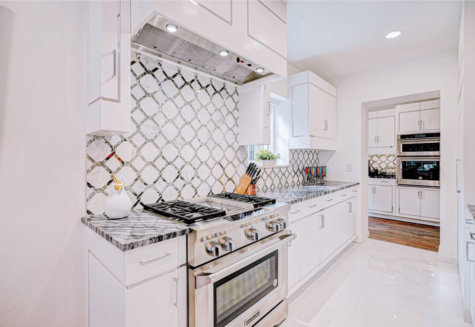 Modern appliances and sleek countertops create a chef-worthy kitchen in this rental.