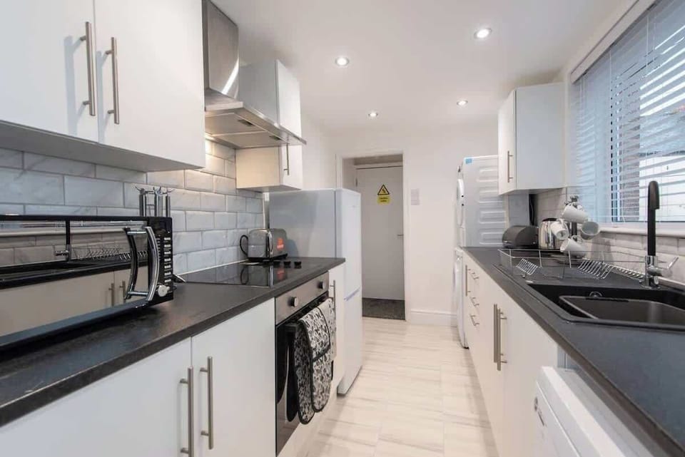 Welcome to our modern kitchen, designed with both style and functionality in mind.