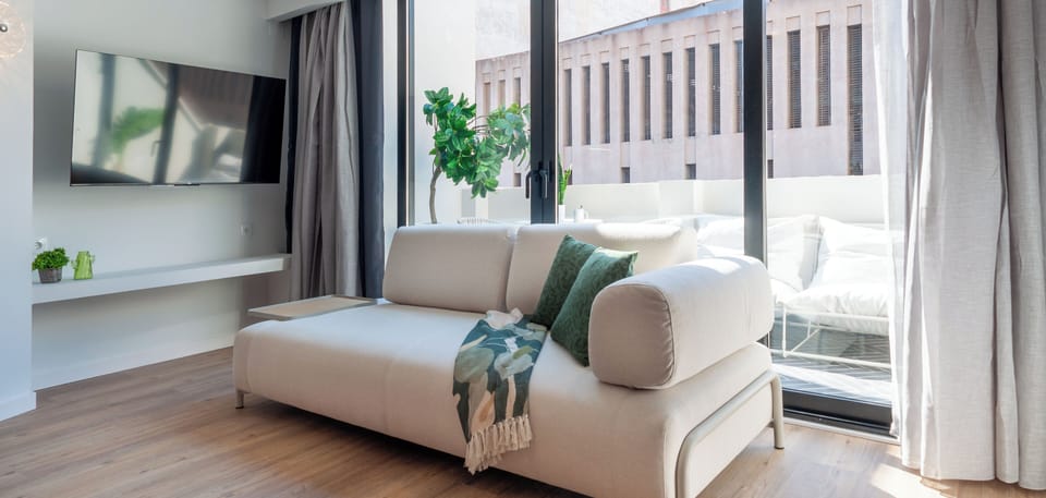 Penthouse | Living area | 40-inch Smart TV with digital channels