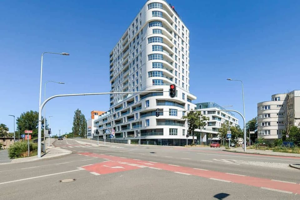 An external view of a modern building, likely an apartment or commercial property.