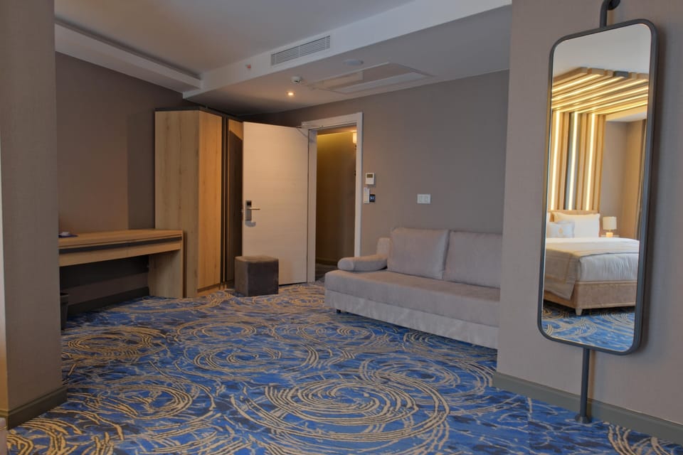 Family Room Sea View | Egyptian cotton sheets, premium bedding, minibar, in-room safe