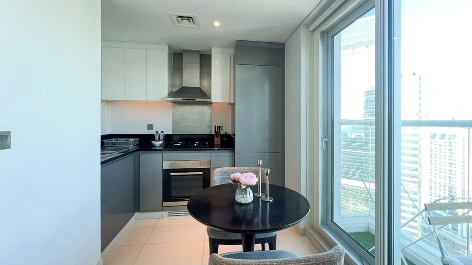 Deluxe Studio, 1 Double Bed, City View | Private kitchen | Fridge, microwave, oven, stovetop