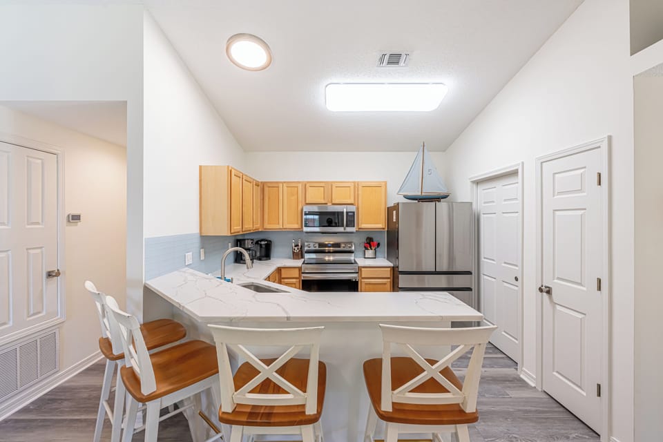 Kitchen With Bar Area