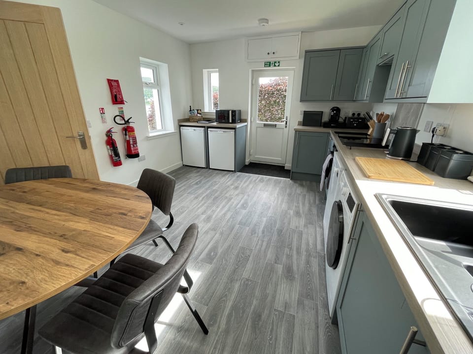 Cottage, 3 Bedrooms | Private kitchen | Fridge, microwave, coffee/tea maker, electric kettle