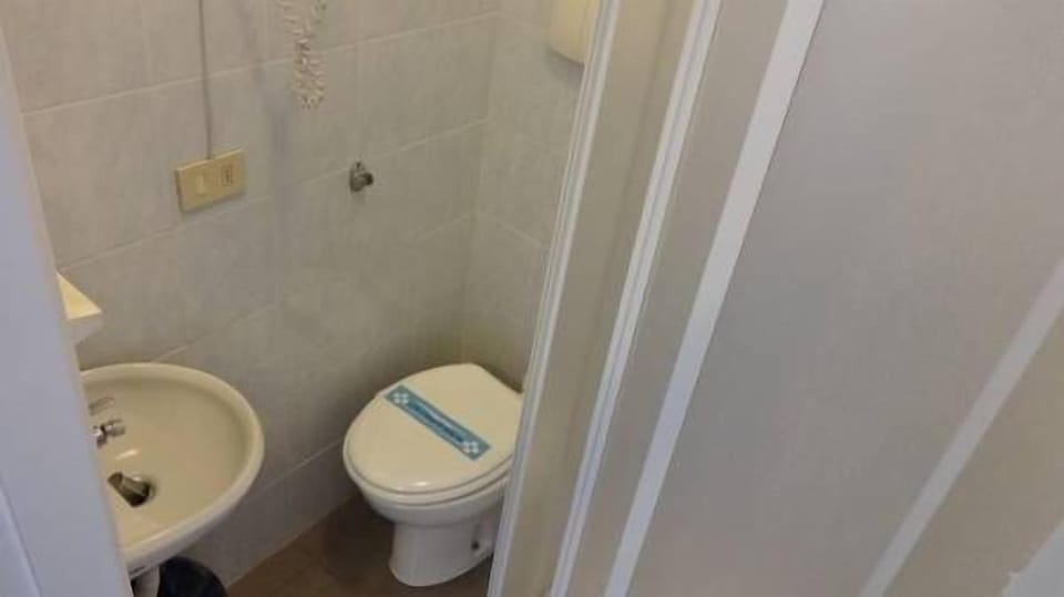 Shower, free toiletries, hair dryer, slippers