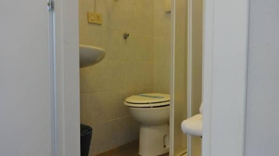 Shower, free toiletries, hair dryer, slippers