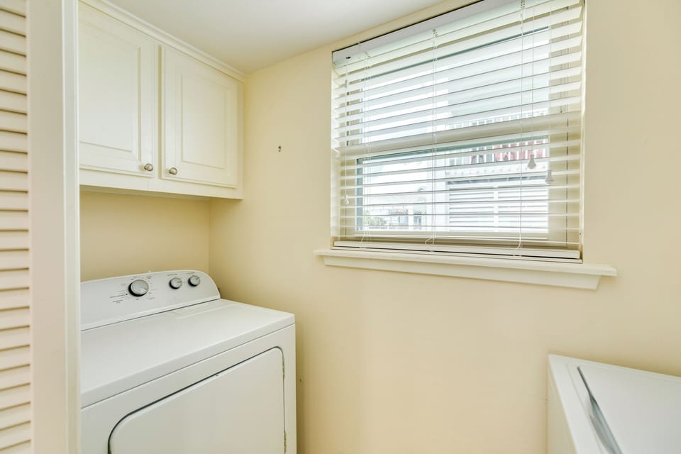 Utility room with washer and dryer