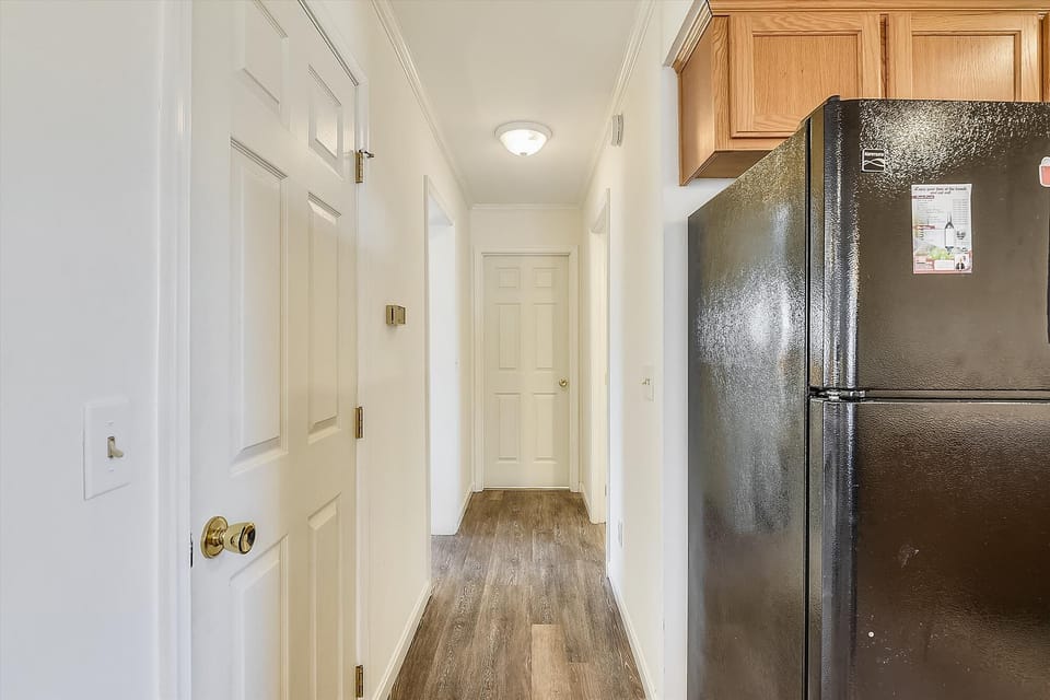 Your kitchen is equipped with a full-size refrigerator and ample cabinetry, making meal prep and storage easy throughout your stay.