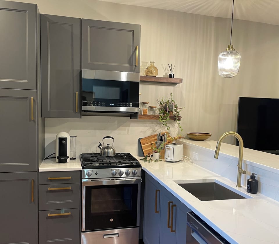 Full kitchen with refrigerator
