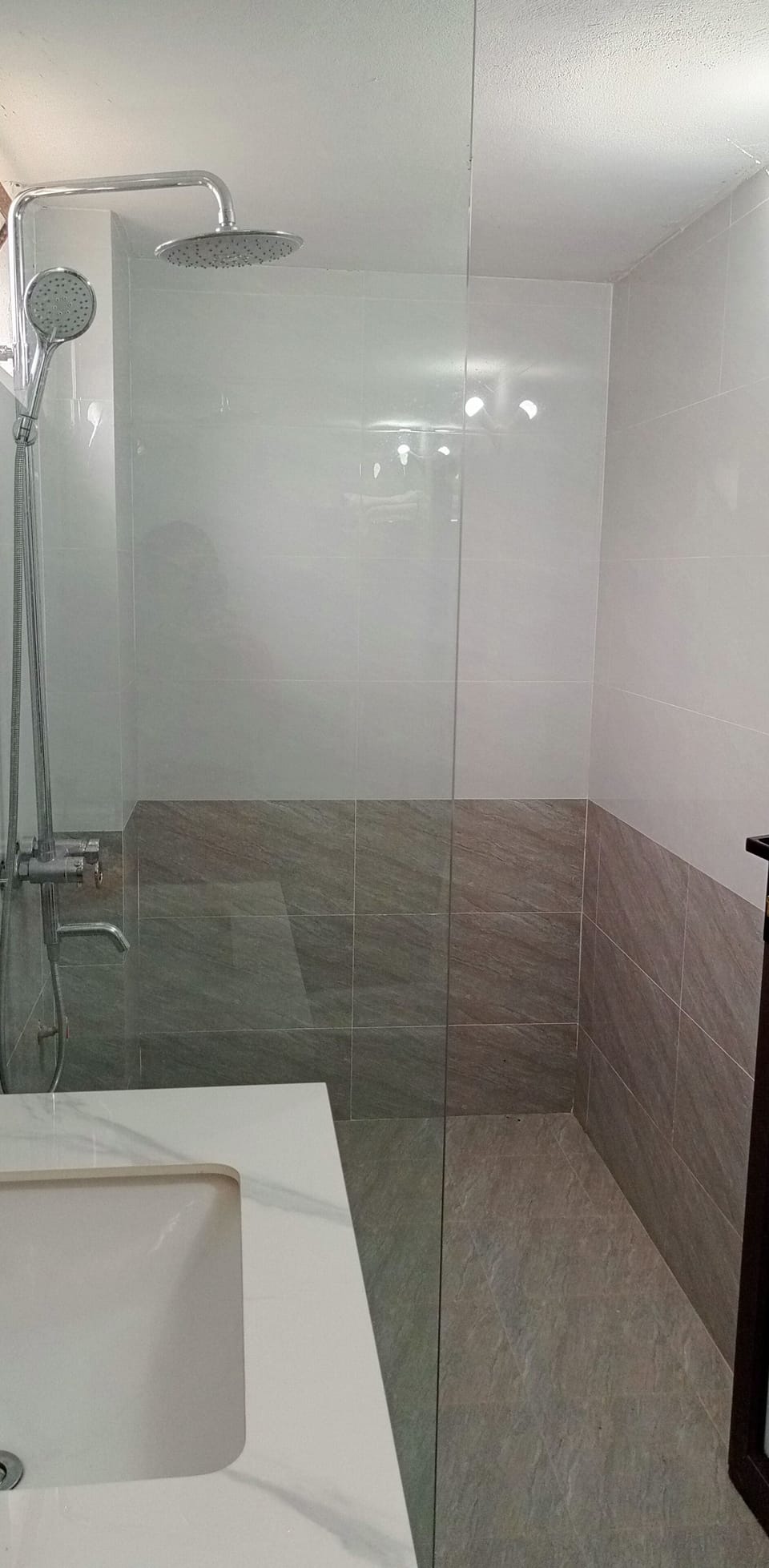 Family Room | Bathroom | Shower, rainfall showerhead, designer toiletries, hair dryer