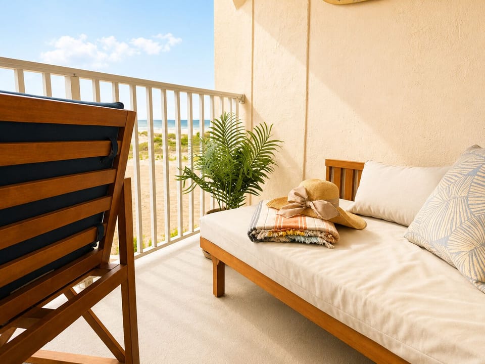 The perfect spot for afternoon naps on the daybed with the ocean breeze flowing through your hair