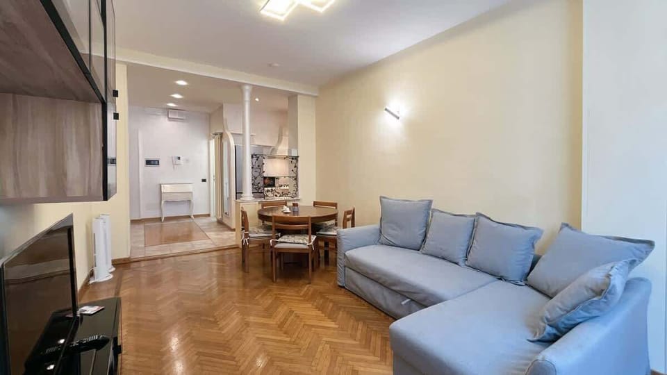 Living room with dining room and sofa