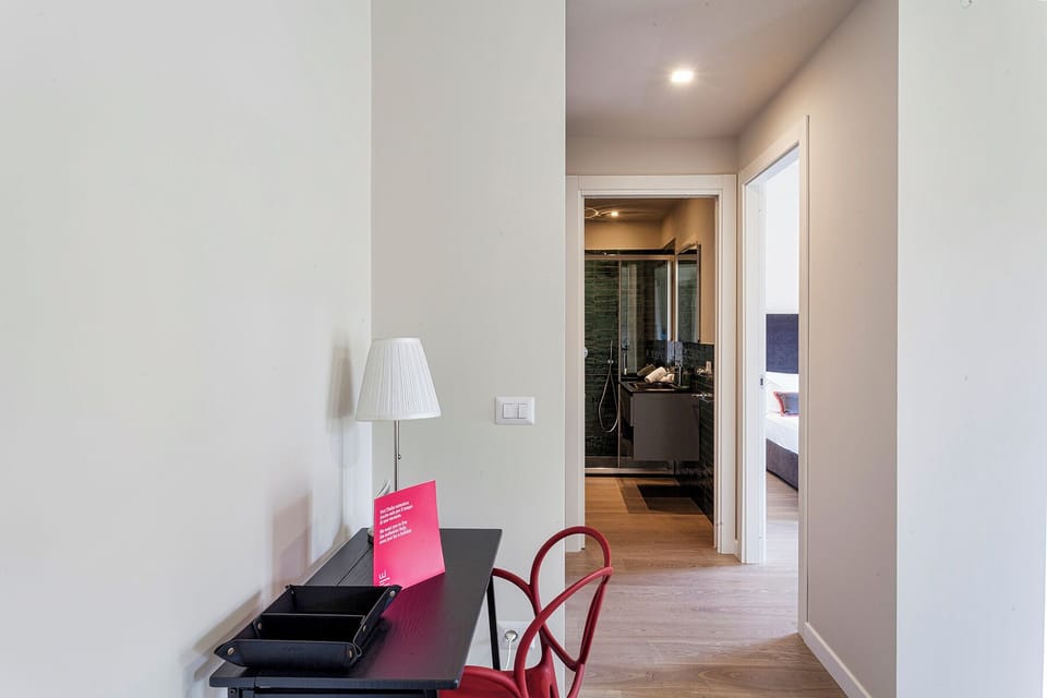 Apartment, Balcony, City View | Living area | 35-inch TV with digital channels