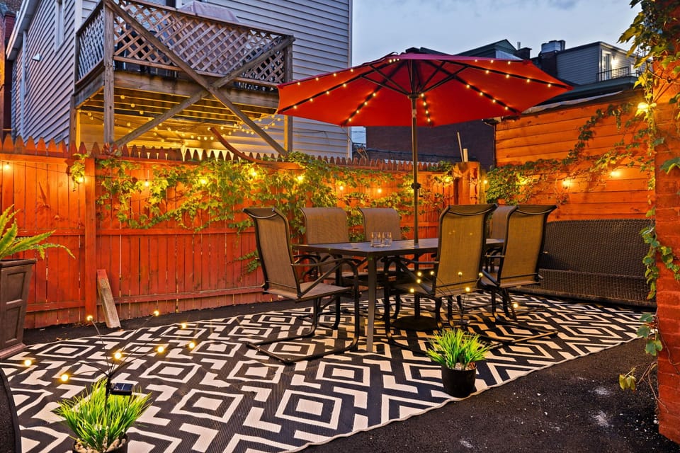 Fairy lights surround the patio