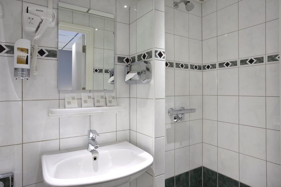 Shower, free toiletries, hair dryer, towels