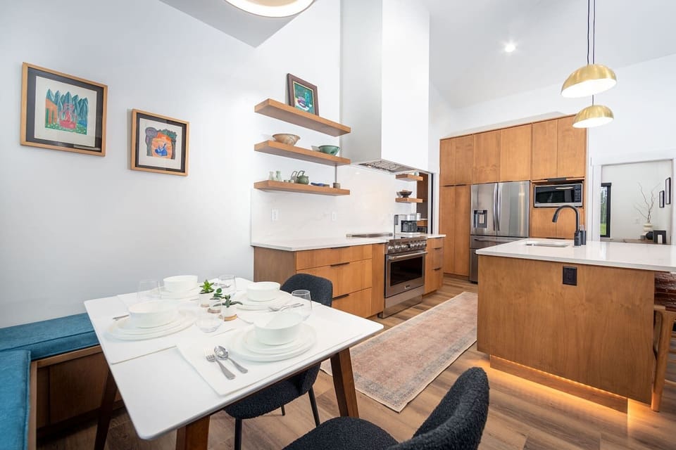 The dinning area is next to the kitchen and provides enough seating for everyone.