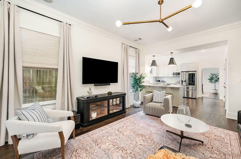 Experience seamless living in our inviting space, where the living room flows effortlessly into a gourmet kitchen, ideal for gatherings and culinary adventures.