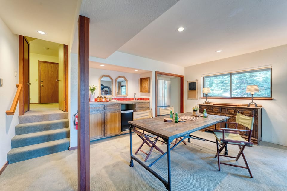 Lower-level living area with a wet bar.