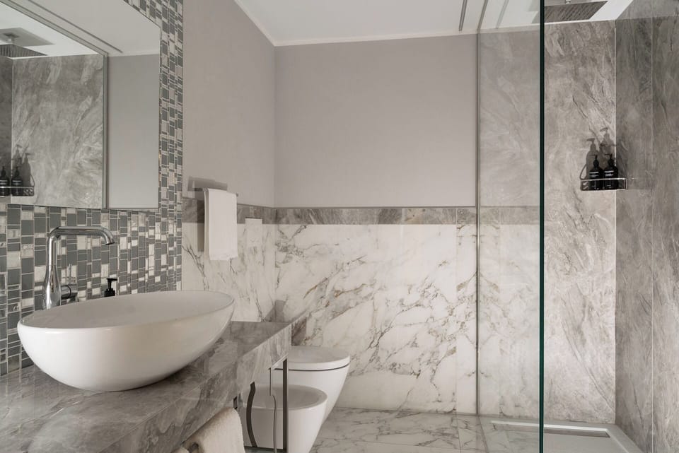 Premium Room (Rooftop) | Bathroom | Deep soaking tub, rainfall showerhead, free toiletries, hair dryer