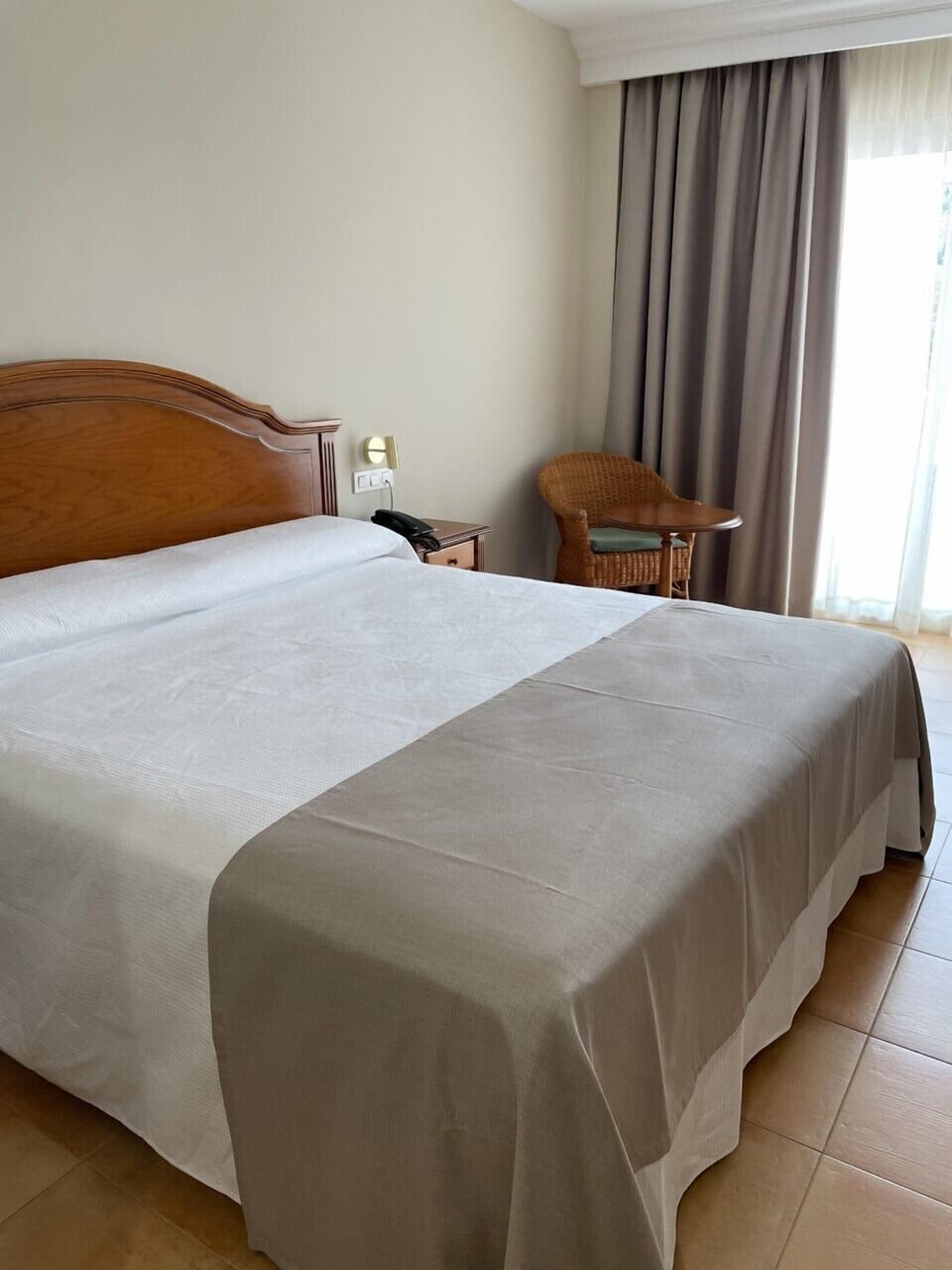 Standard Double Room | Minibar, in-room safe, desk, blackout drapes