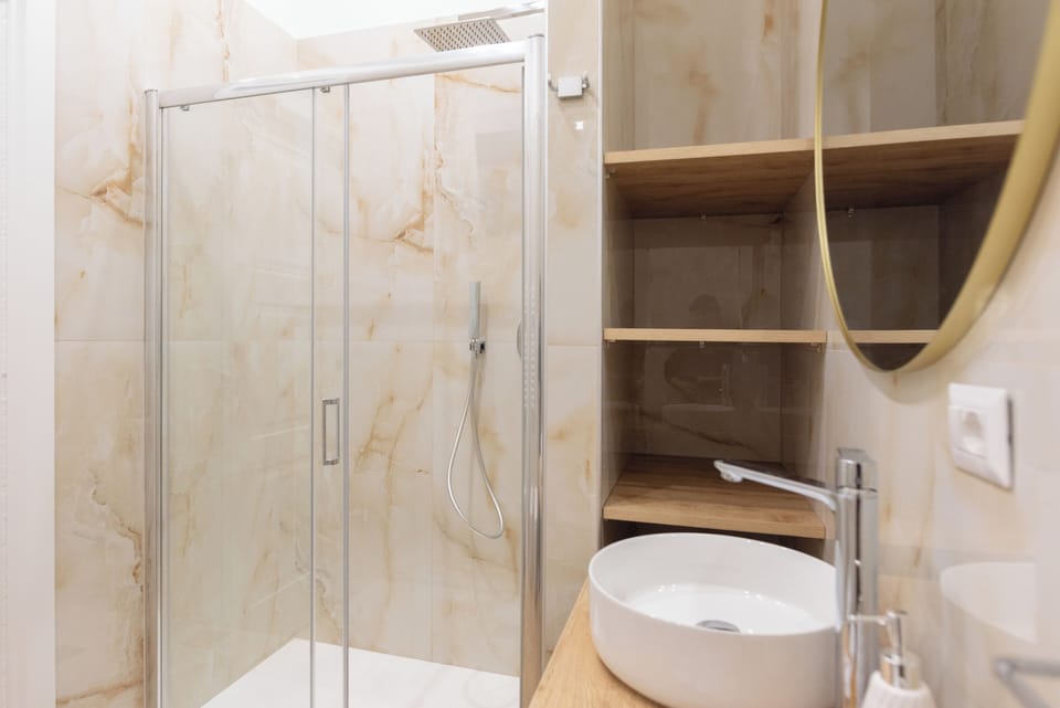 Exclusive Room | Bathroom | Shower, rainfall showerhead, hair dryer, bathrobes