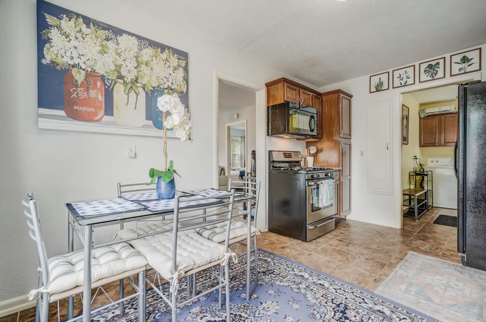 Fully stocked kitchen with seating for four