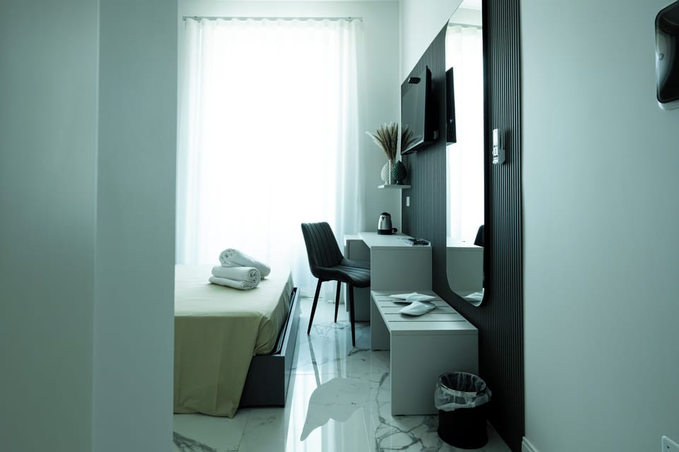 Double or Twin Room, Balcony, City View | In-room safe, desk, laptop workspace, blackout drapes