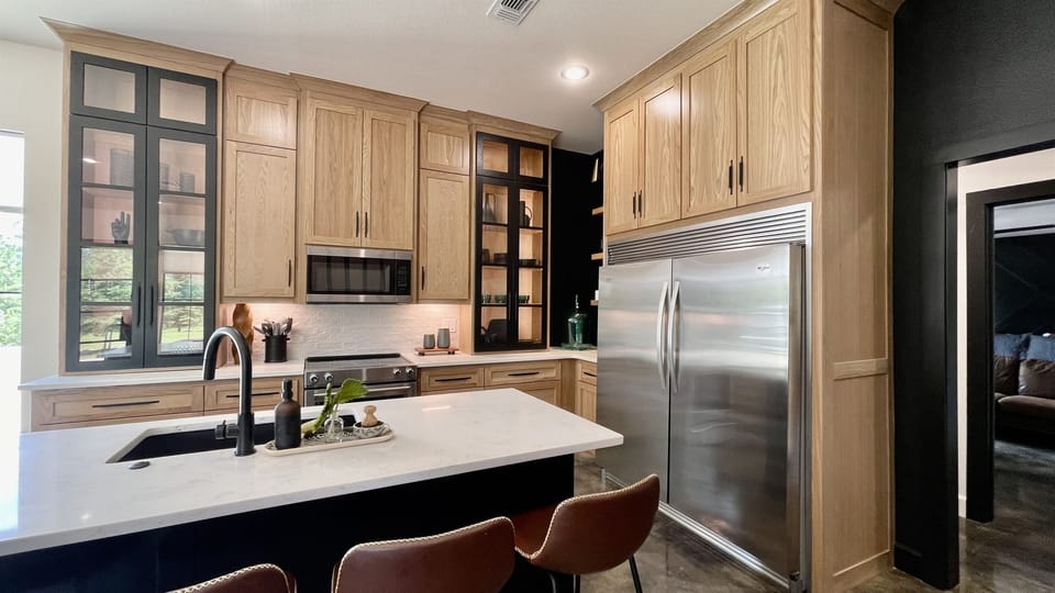 kitchen with 5 ft wide refrigerator