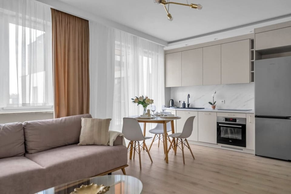 Comfortable Living Room with Sofa Bed and Smart TV | Book Now with RENTUJEMY