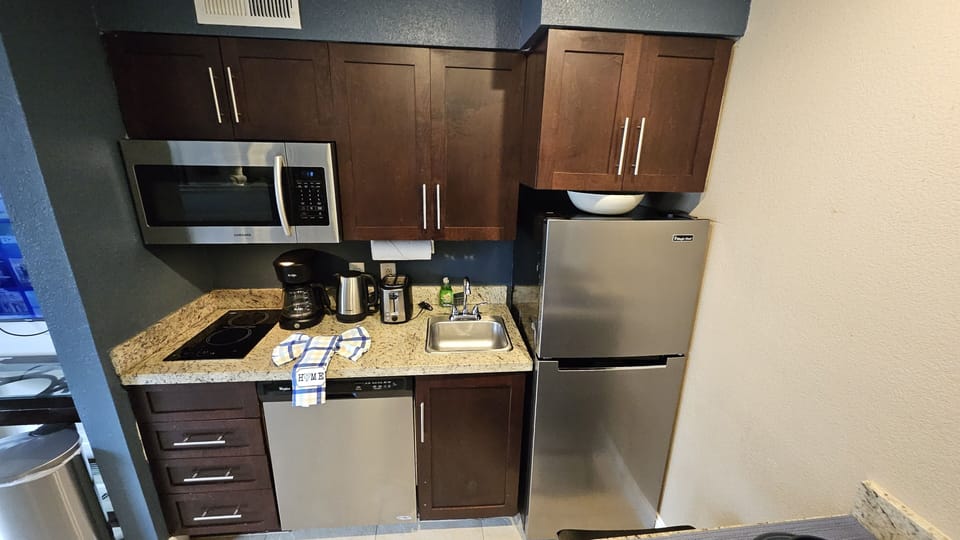 Fully stocked with the basics to whip up a home-style meal. Appliances: Coffee m