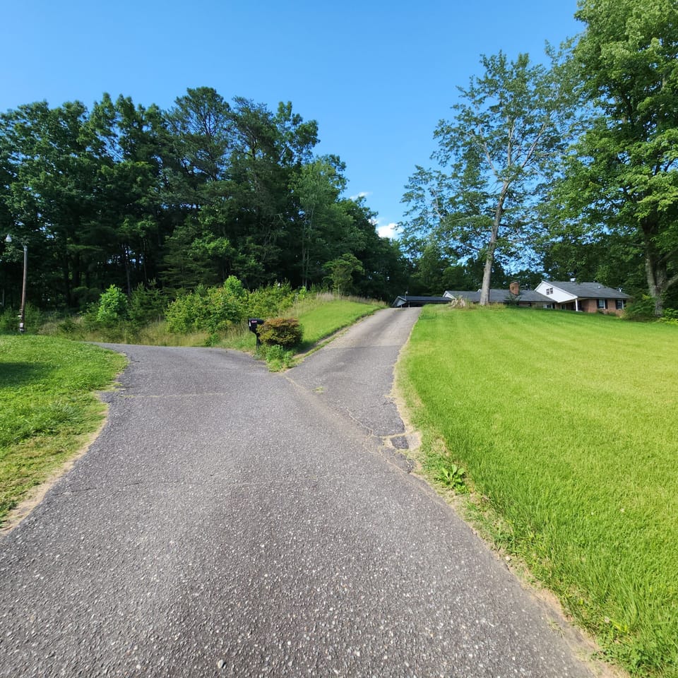 The driveway leading to our home that you'll follow to get to the rental