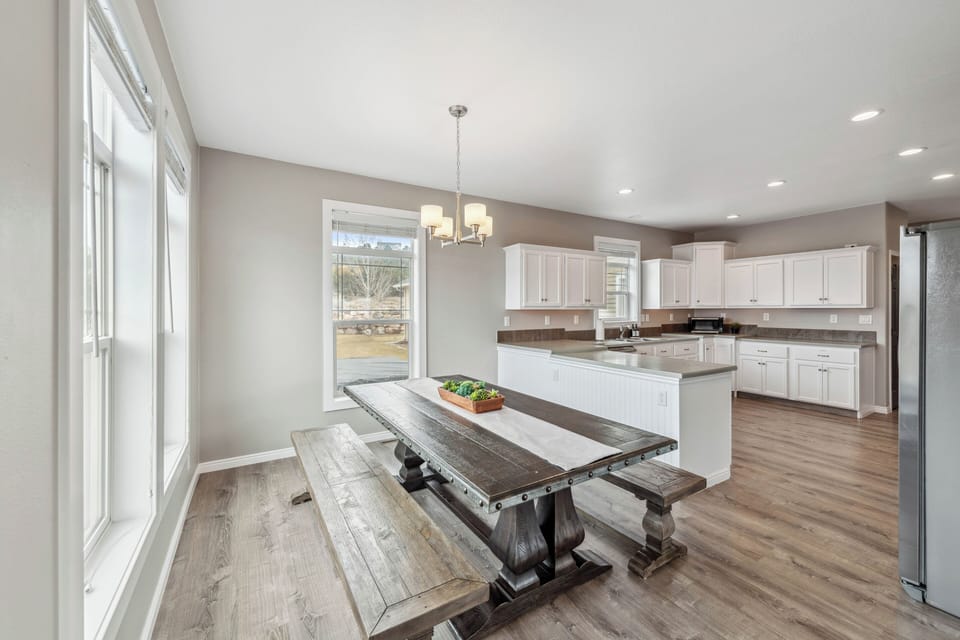 Enjoy meals together at the dining table with bench seating.