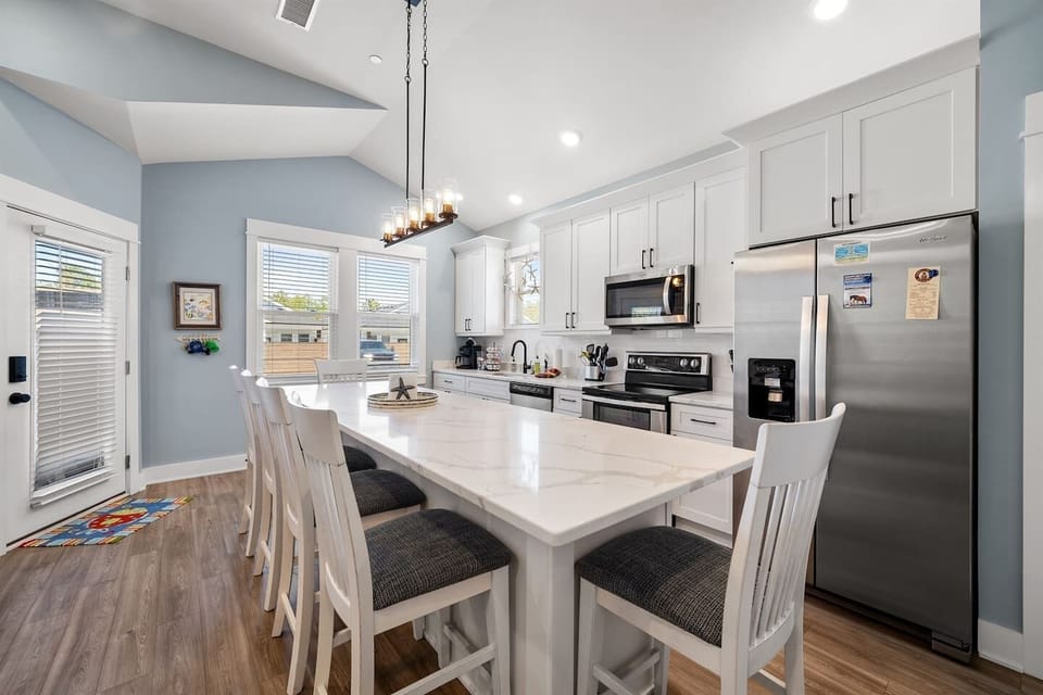 Dining area and kitchen perfect for gathering with family and friends