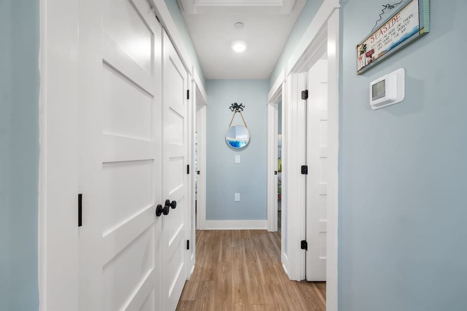 Interior hallway connecting bedrooms and living space