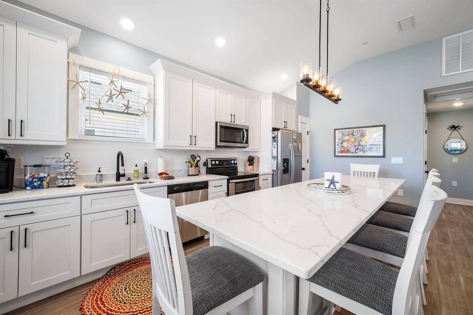 Large kitchen island with seating and modern finishes