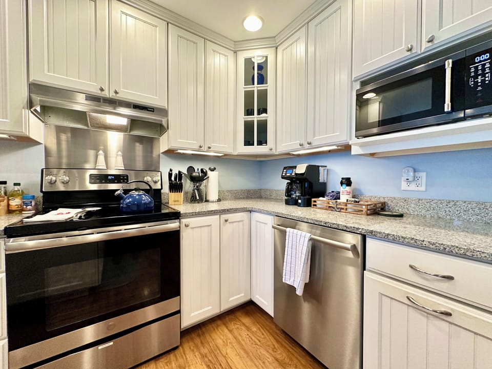 Dishwasher, Electric Range, Duo Coffee Maker w/ Complimentary Coffee, Sugar, Etc