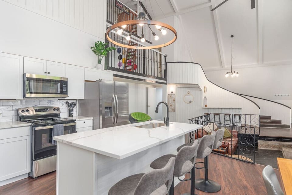 Prepare a meal or enjoy a beverage in the bright and open kitchen.