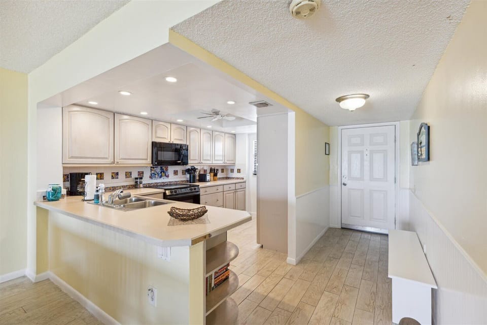 A bright and spacious kitchen, perfect for cooking and gathering.