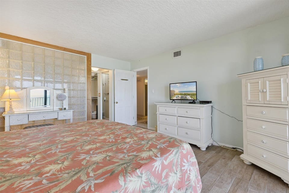 Unwind and watch TV in the master bedroom